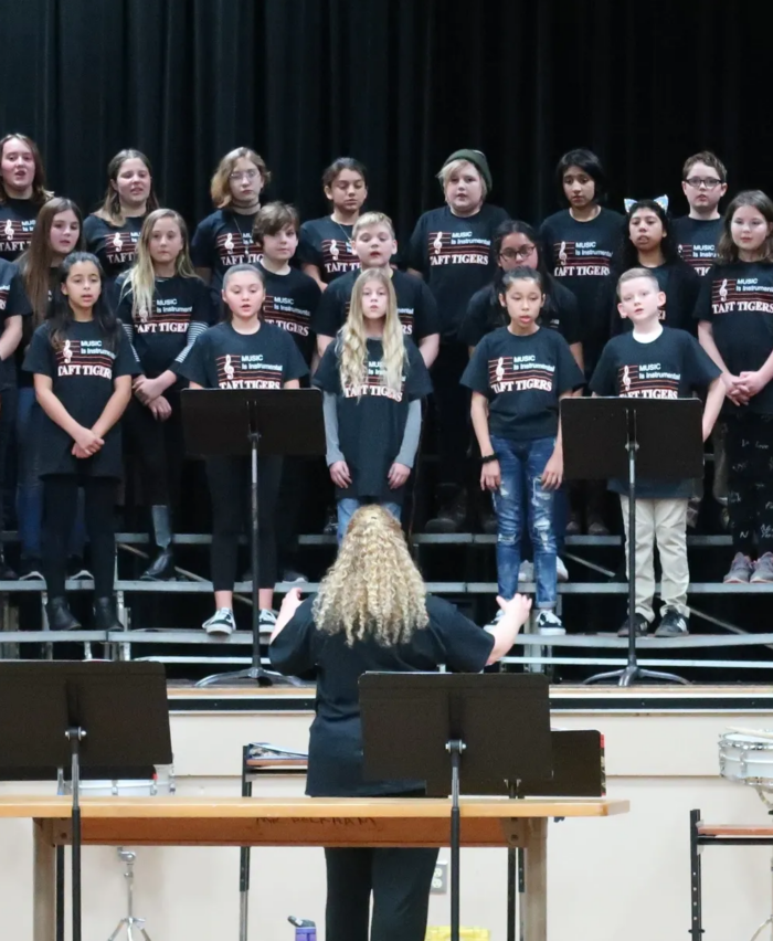 Photo of youth singing. Mad Hatter FunRaiser - Music is Instrumental