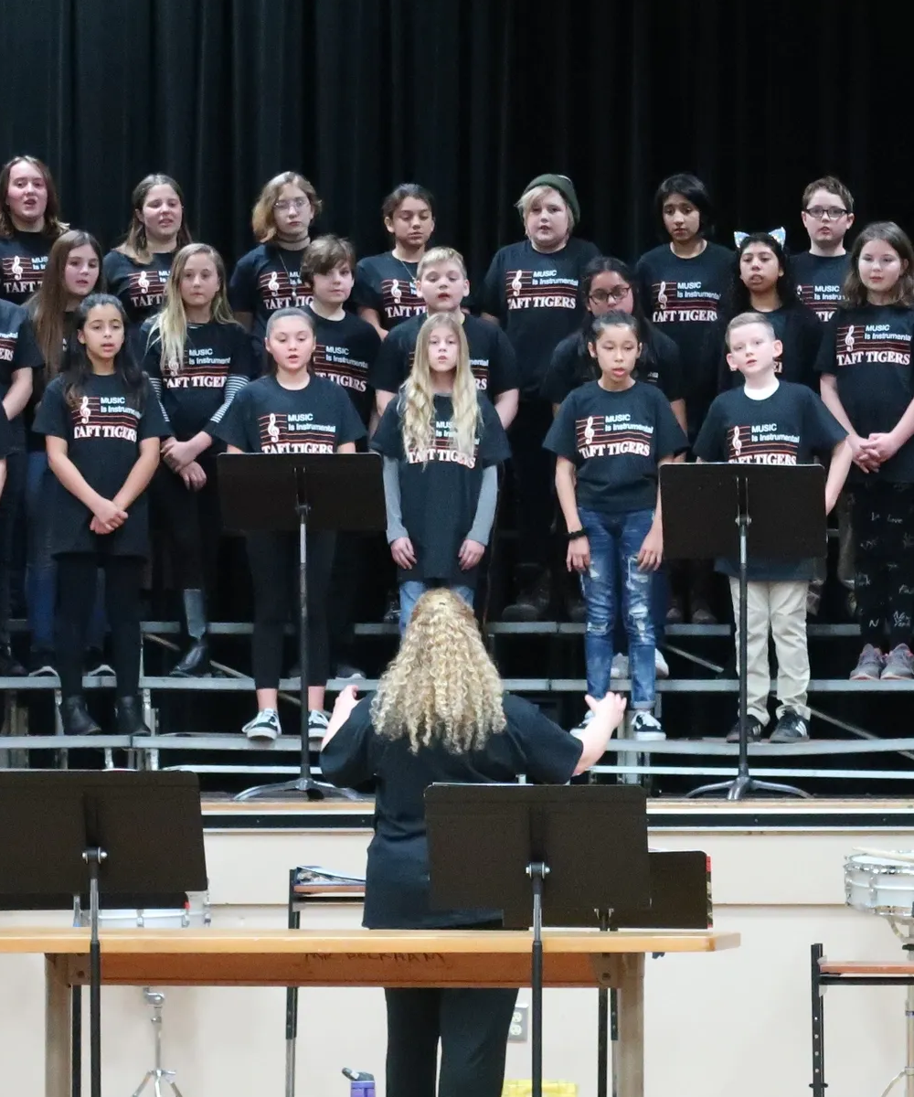 Photo of youth singing. Mad Hatter FunRaiser - Music is Instrumental